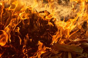 flames of fire with smoke on a black infographic